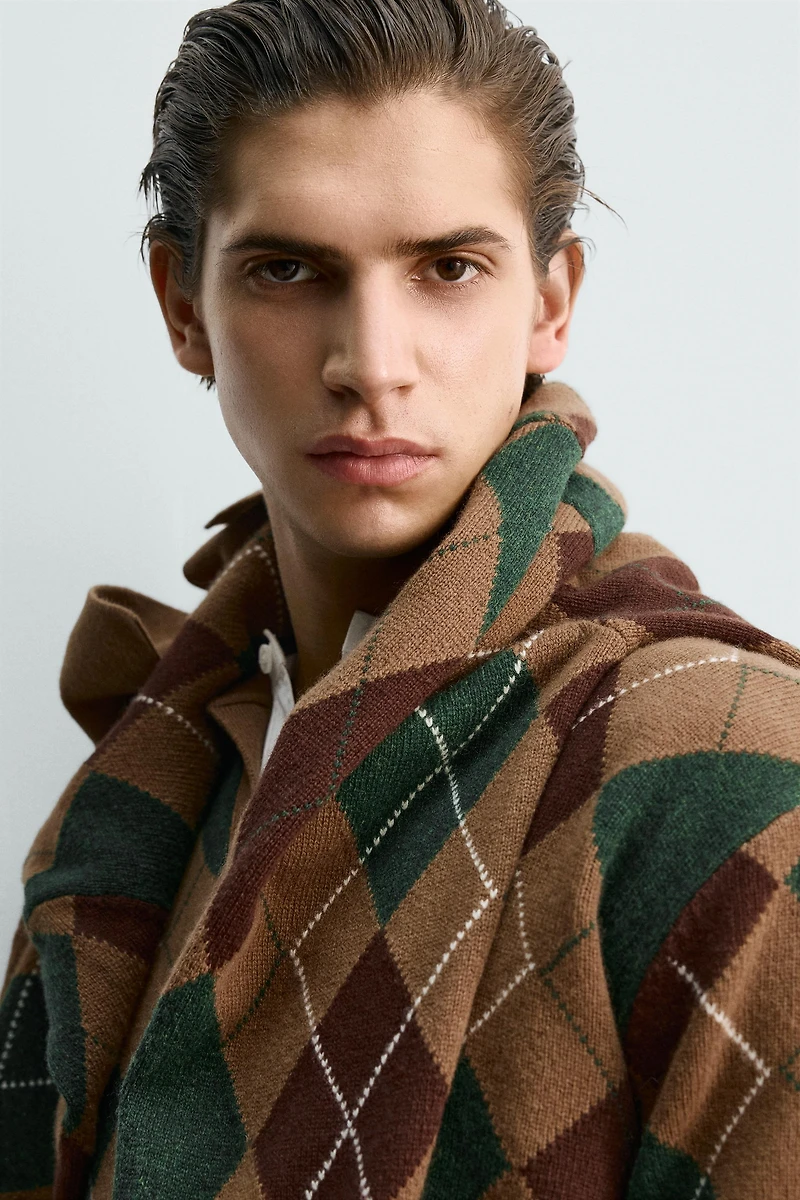 POLO EN MAILLE À LOSANGES 100 % LAINE