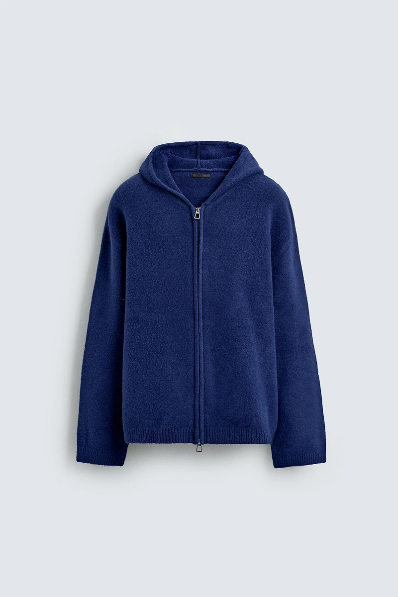 GILET EN MAILLE À CAPUCHE
