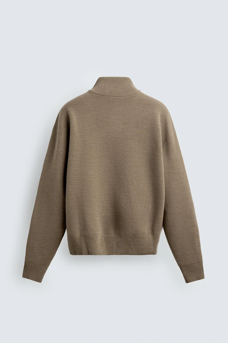 PULL À COL ZIPPÉ