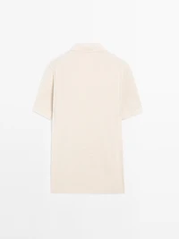 Polo en maille de coton à col zippé