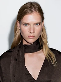 Long flowing blouse with tied neck