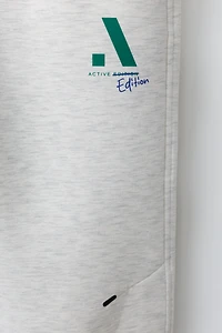 PANTALON SPORT LOGO NÉOPRÈNE