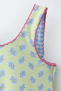 MAILLOT DE BAIN RÉVERSIBLE FLEURS ET CARREAUX (2-6 ANS)