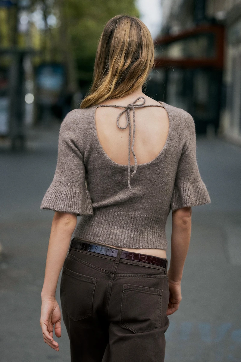 TOP EN MAILLE DOS NU