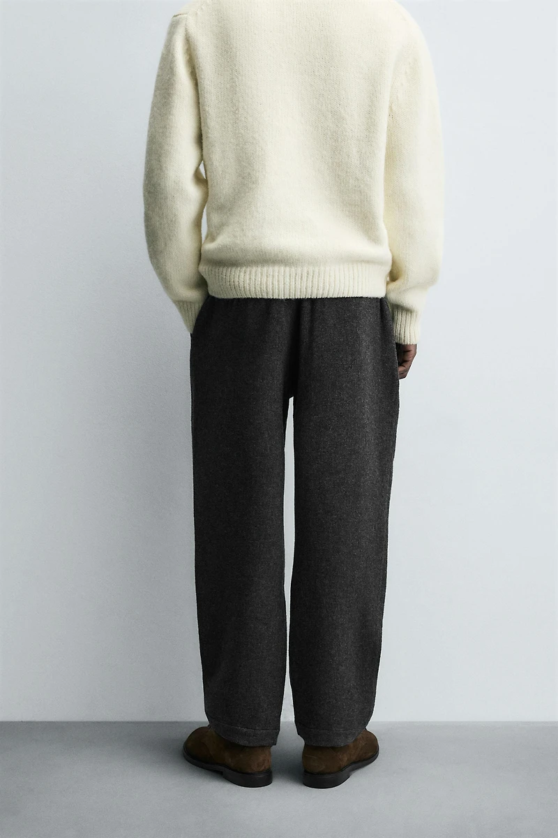 PLEATED WOOL PANTS