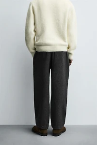 PLEATED WOOL PANTS