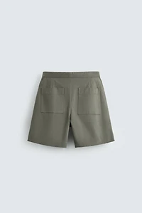 RELAXED FIT PLEATED BELTED SHORTS