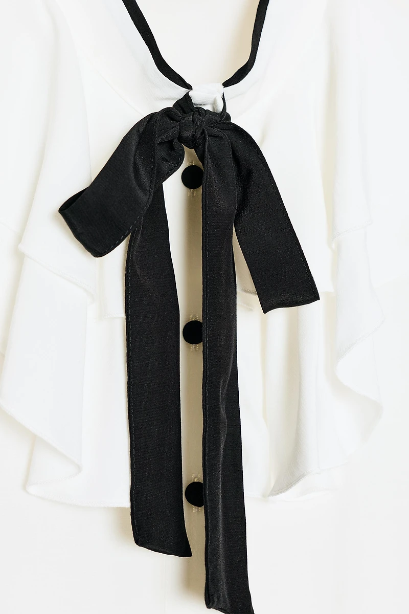 CONTRAST TIE RUFFLE BLOUSE