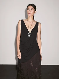 Long pleated skirt with embroidered detail
