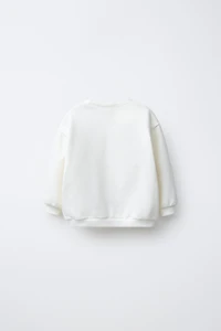FLOCKED PRINT SWEATSHIRT