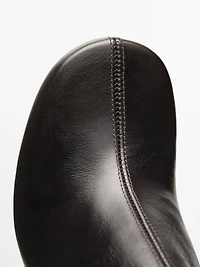 Shiny leather high-heel ankle boots