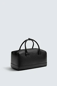 TEXTURED RUBBERIZED CROSSBODY BAG