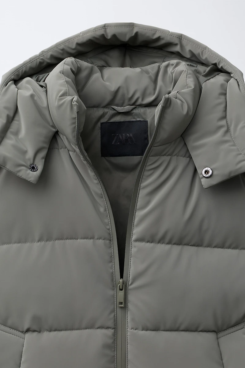MANTEAU LONG À ÉTIQUETTE GOMMÉE