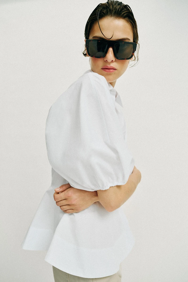 CHEMISE PÉPLUM À MANCHES BOUFFANTES