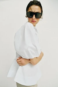 CHEMISE PÉPLUM À MANCHES BOUFFANTES