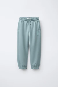 SPORTY JOGGER PANTS WITH RUBBERIZED LABEL