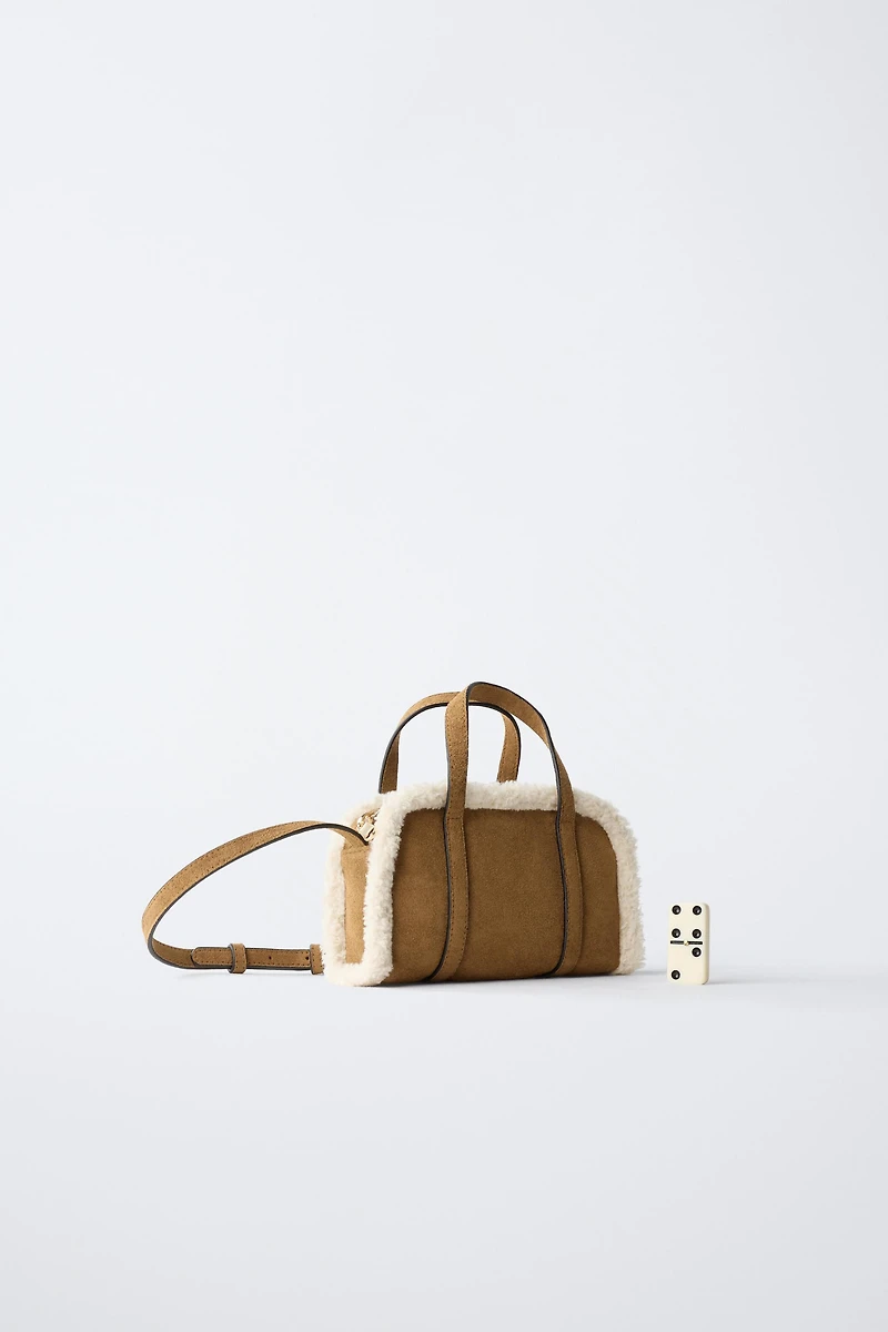 SAC BANDOULIÈRE EN PEAU DE MOUTON