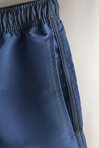 SOLID CONTRAST SWIM TRUNKS