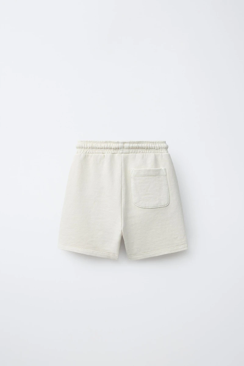 EMBROIDERED GARMENT DYED PLUSH SHORTS