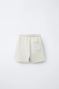 EMBROIDERED GARMENT DYED PLUSH SHORTS