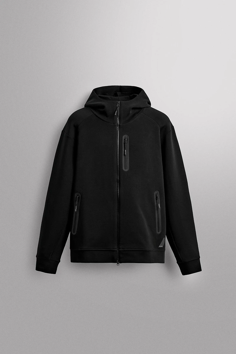 TECHNICAL ZIP-UP HOODIE