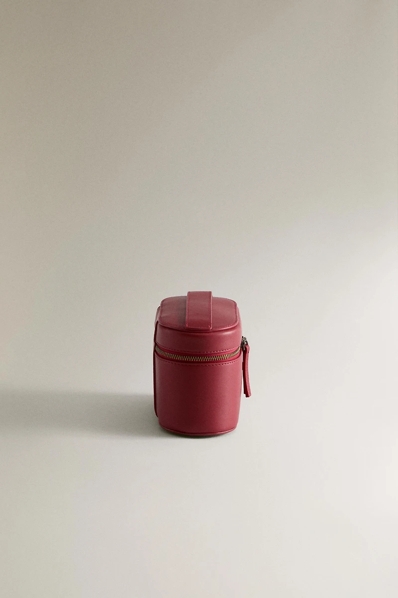 MINI TROUSSE DE TOILETTE RIGIDE EN CUIR