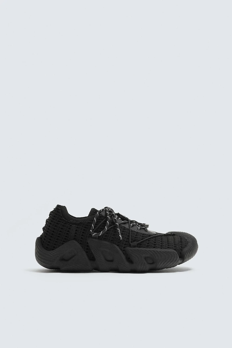 IRREGULAR SOLE SNEAKERS