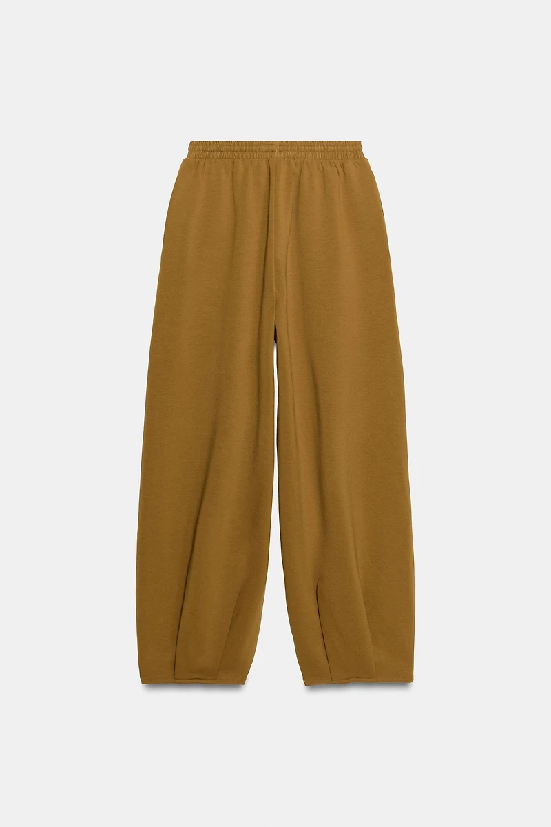 PLEATED TROUSERS