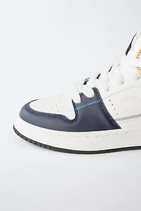 HIGH TOP SNEAKERS WITH PIECES