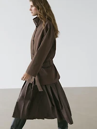 Mid-length trench coat with belt detail