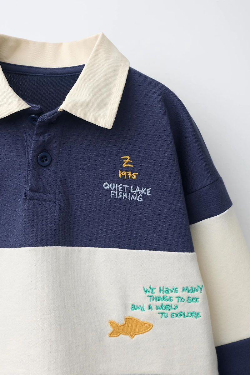 POLO EN MAILLE À RAYURES ET BRODERIES