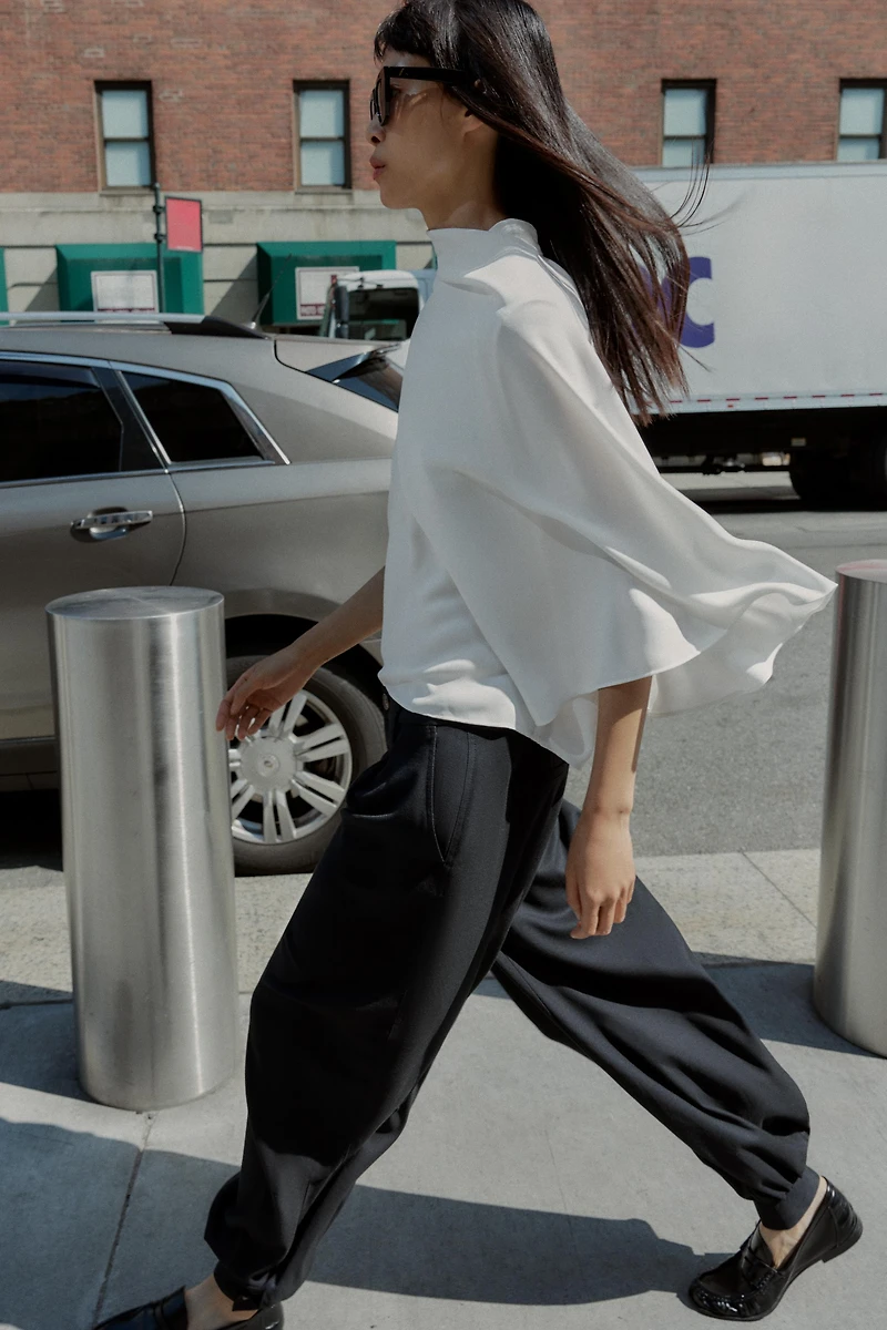 ASYMMETRIC CREPE CAPE TOP
