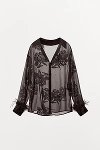 BLOUSE SEMI-TRANSPARENTE PAILLETTES PLUMES