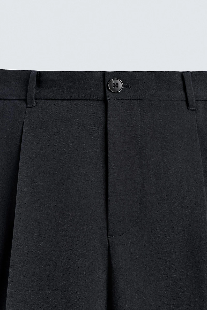 RELAXED FIT PLEATED SUIT SHORTS