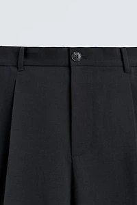 RELAXED FIT PLEATED SUIT SHORTS