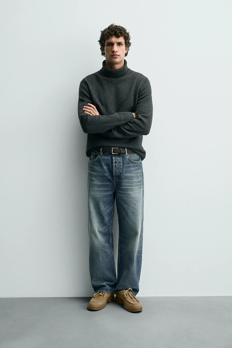 CHAUSSURES EN CUIR BORDÉES