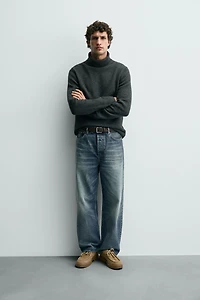 CHAUSSURES EN CUIR BORDÉES