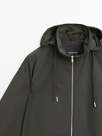 Technical fabric trench coat with hood