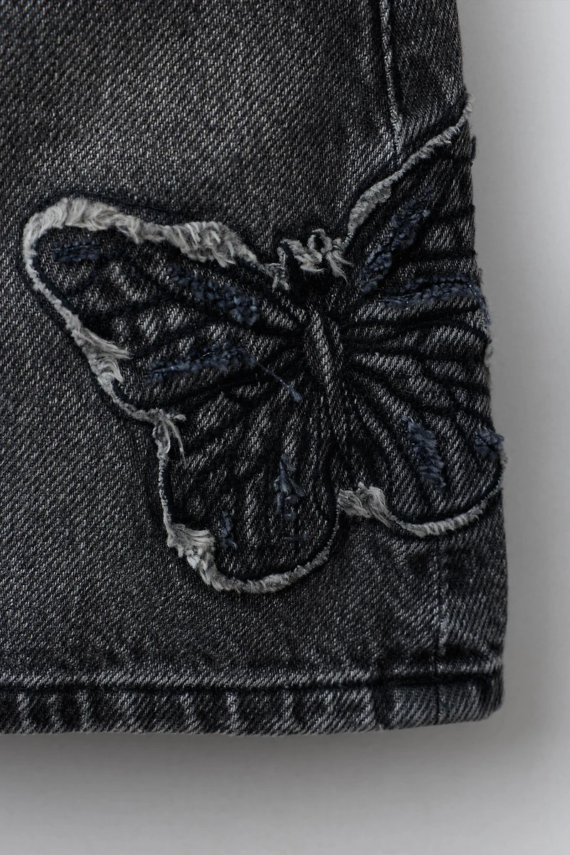 JUPE EN DENIM PAPILLON BRODÉ