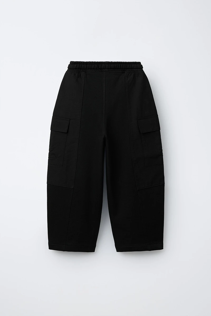 COMBINATION PANTS WITH LABEL