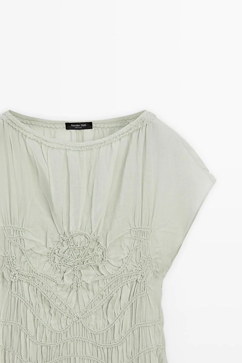 Long flowing dress with embroidered details