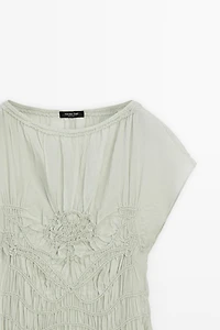 Long flowing dress with embroidered details