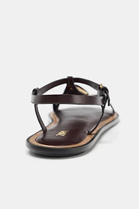 SANDALS WITH METALLIC APPLIQUÉ