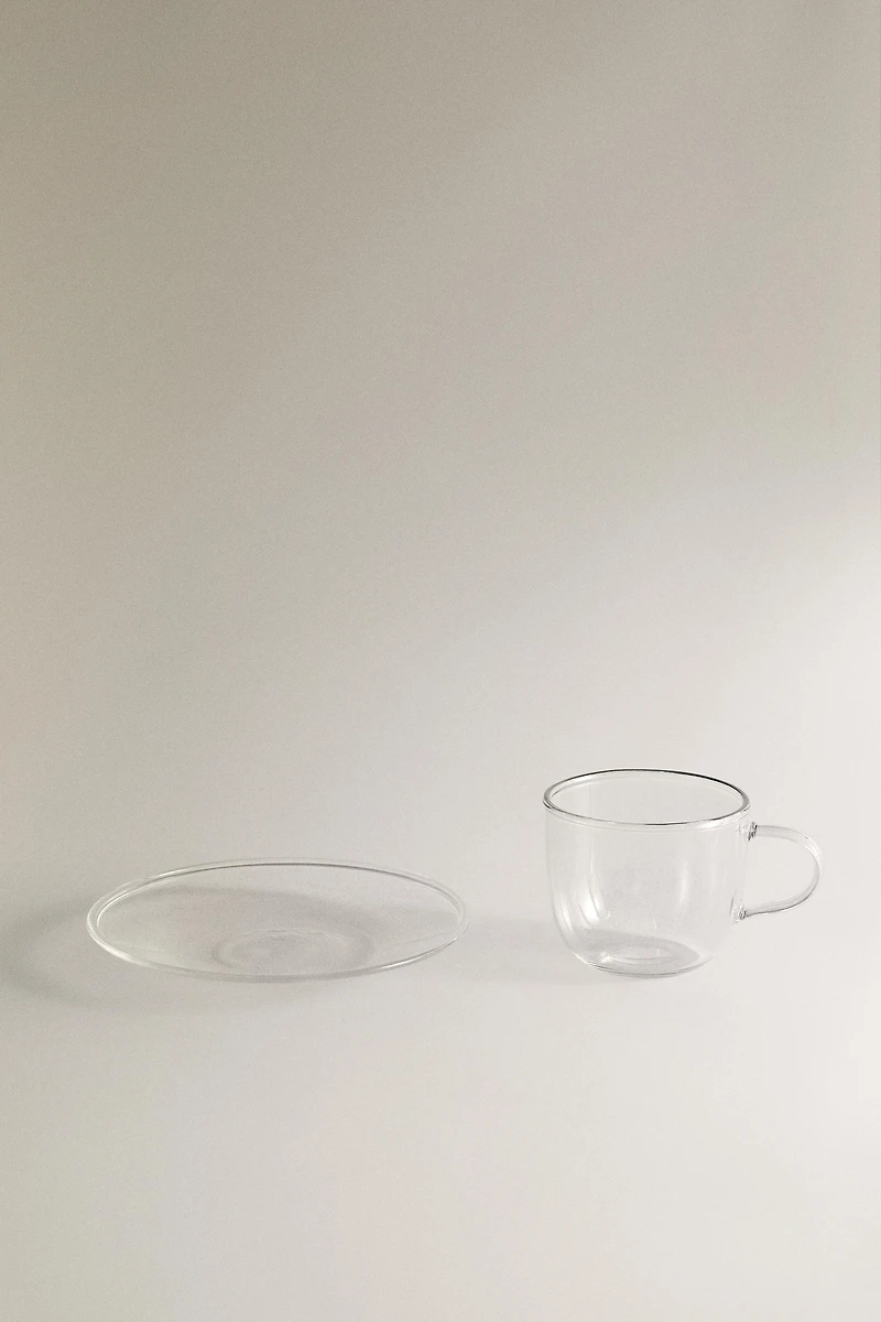 BOROSILICATE GLASS TEA CUP AND SAUCER WITH SILVER RIM