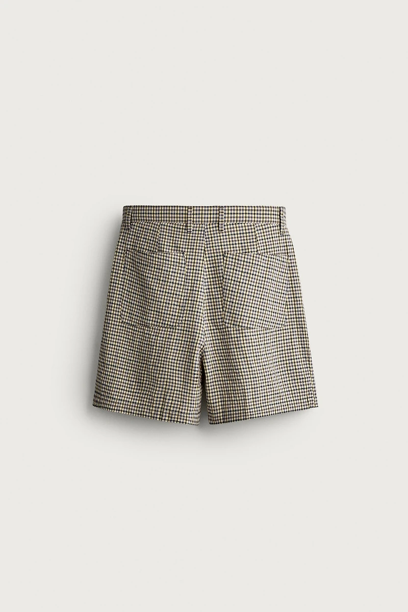 TEXTURED PLAID PLEATED SHORTS