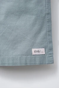 BERMUDA EN COTON COUPE AMPLE ÉTIQUETTE