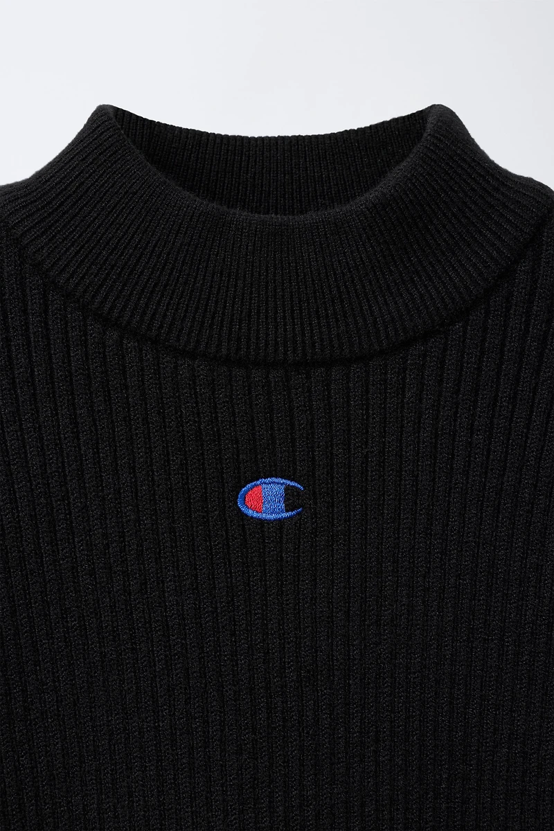 PULL CANNELÉ COL CHEMINÉE CHAMPION ® X ZARA