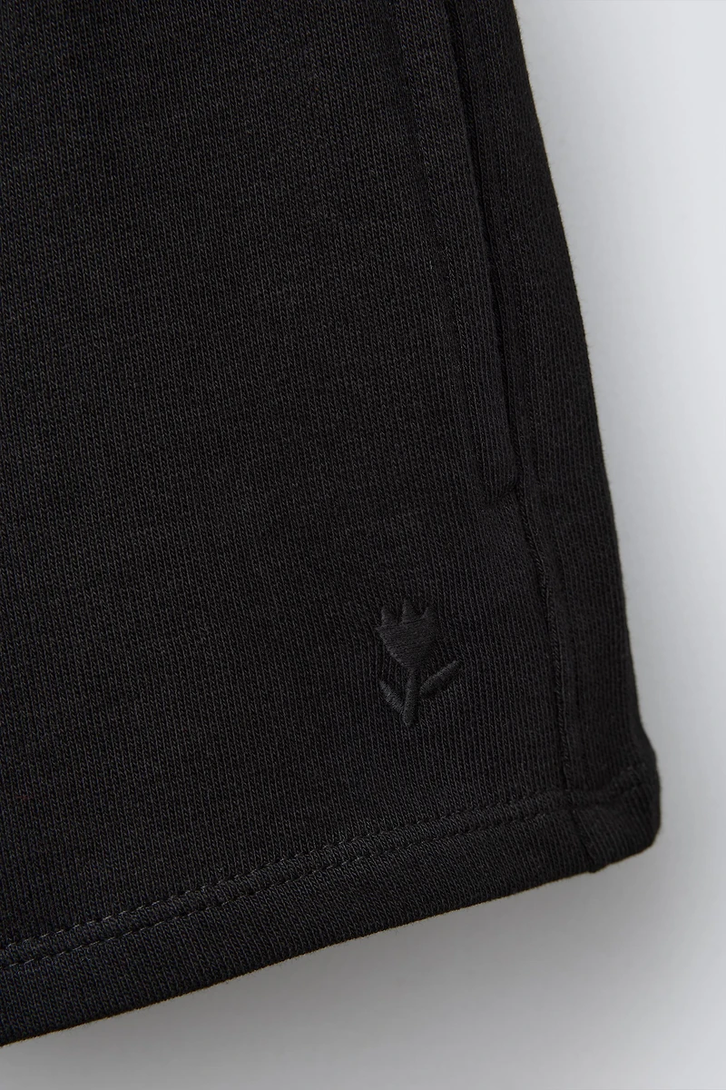 EMBROIDERED PLUSH SHORTS