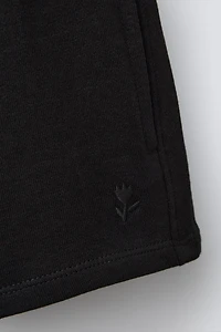 EMBROIDERED PLUSH SHORTS