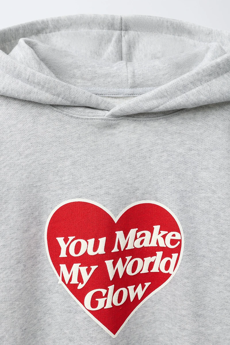 HEART PRINT SWEATSHIRT